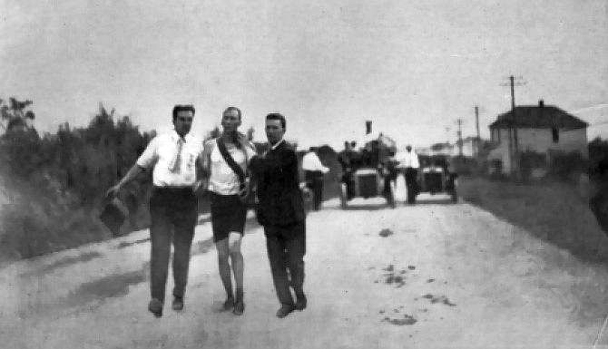Thomas Hicks is aided to the finish line during the 1904 Olympic Marathon