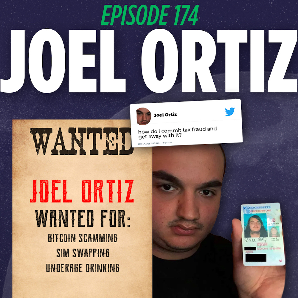 Joel Ortiz holding up his id behind a wanted poster that bears his name and reads "wanted for bitcoin scamming, sim swapping, and underage drinking."