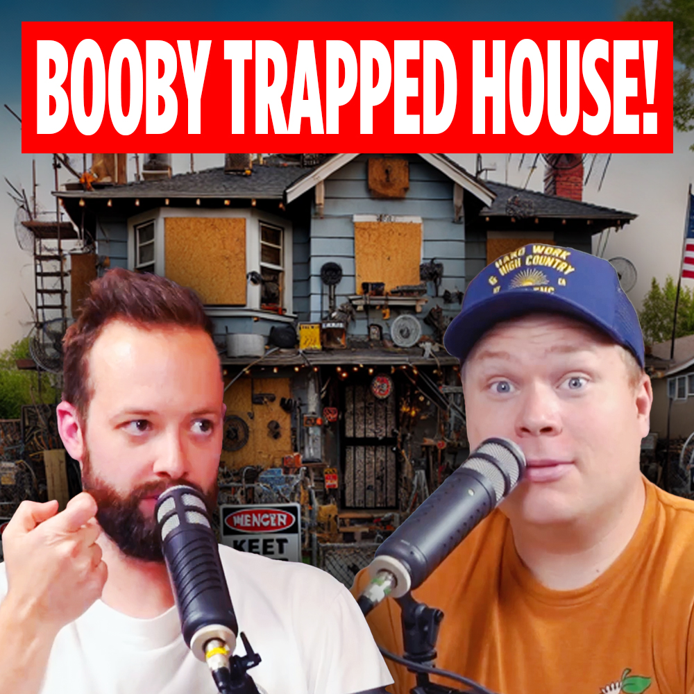 Comedy podcasters Jaron Myers and Tim Stone talking on mic in front of a boarded up house and a banner that reads 'booby trapped house!'