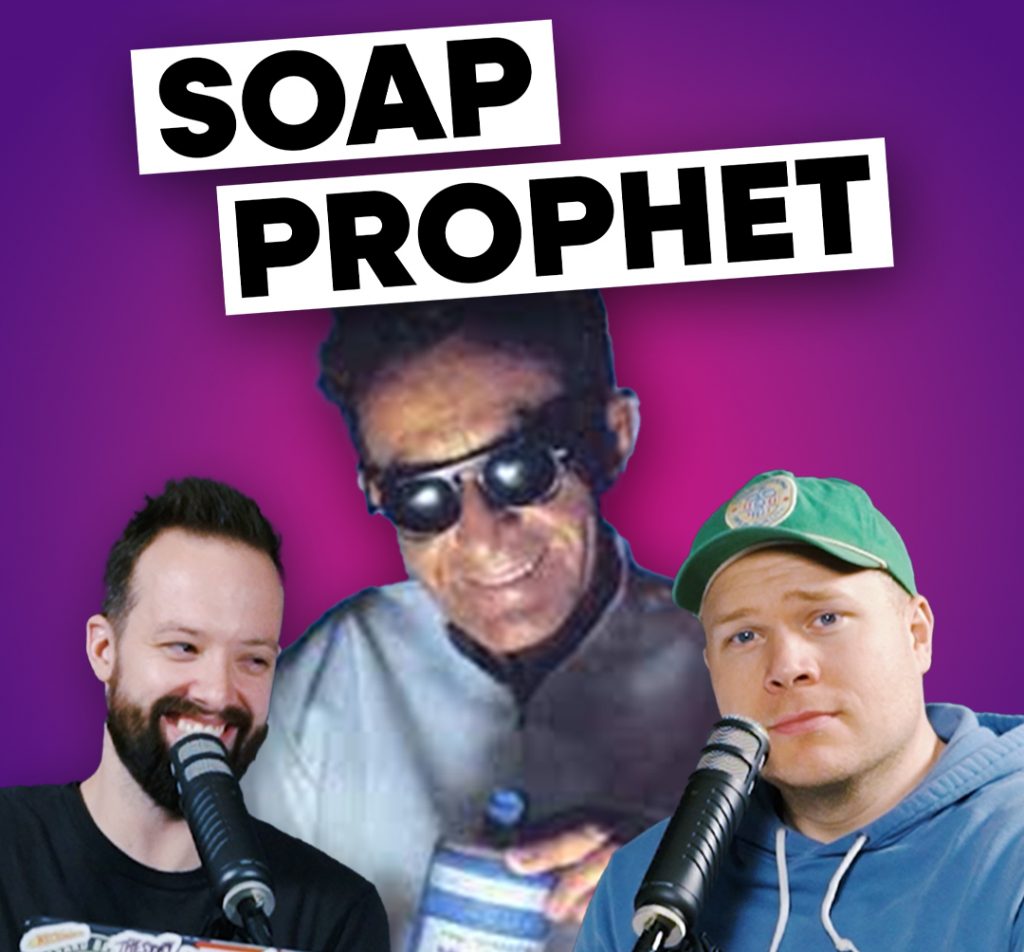 Dr Bronner in sunglasses smiling behind comedy podcasters jaron myers and tim stone with a banner that reads 'soap prophet'