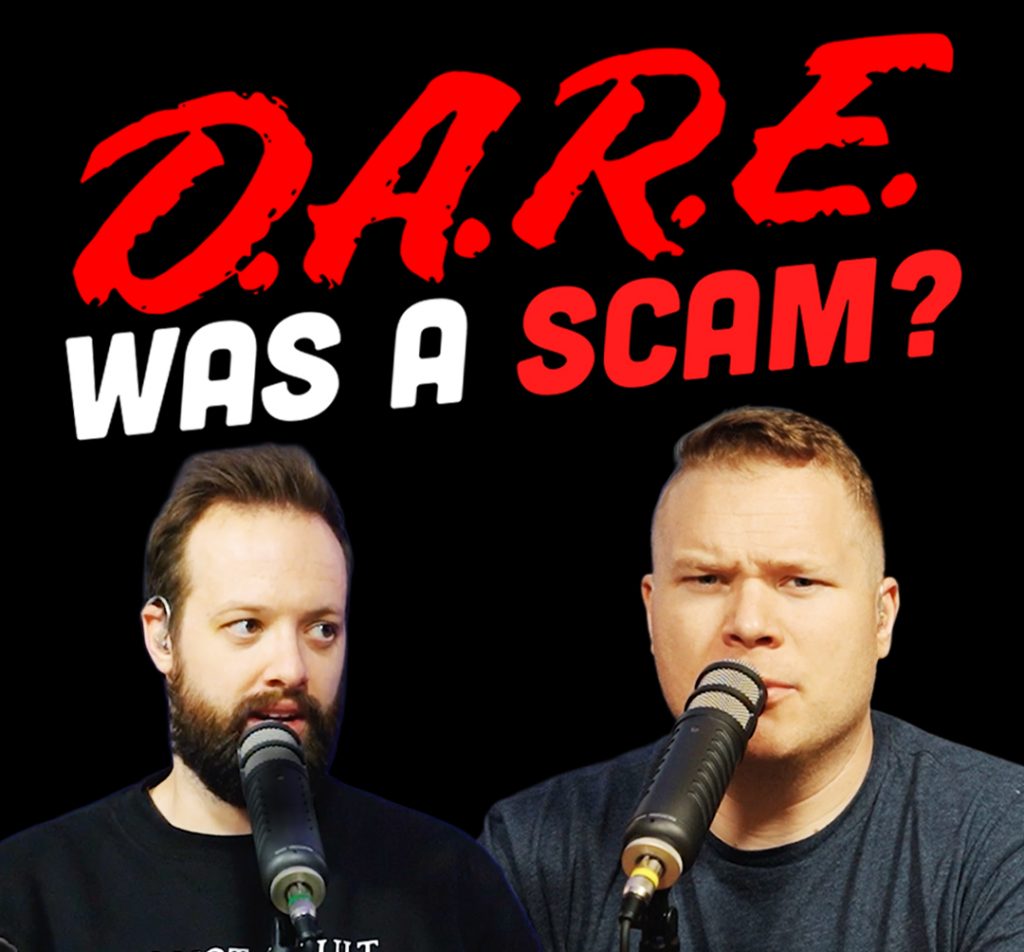 The dare logo behind comedy podcasters Jaron Myers and Tim Stone with a banner that reads Dare was a scam?